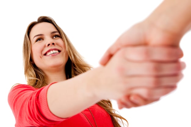 Casual handshake - isolated over a white background